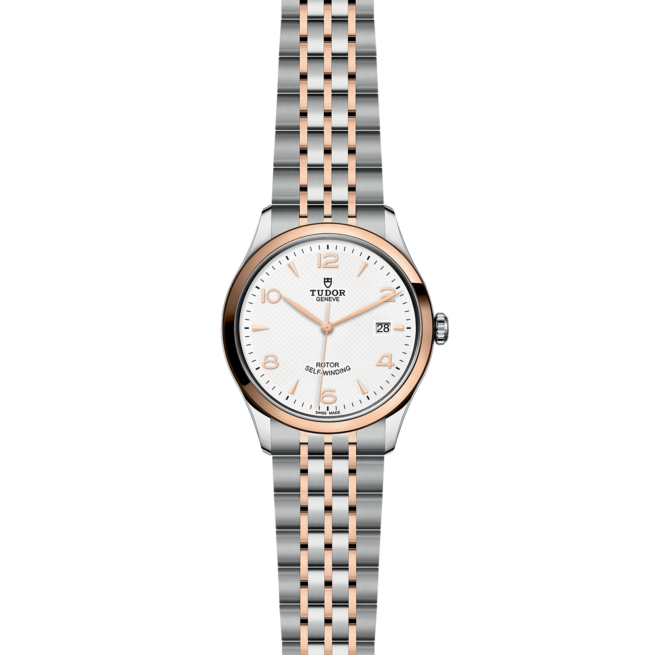 A women's watch with a white dial and rose gold bracelet.