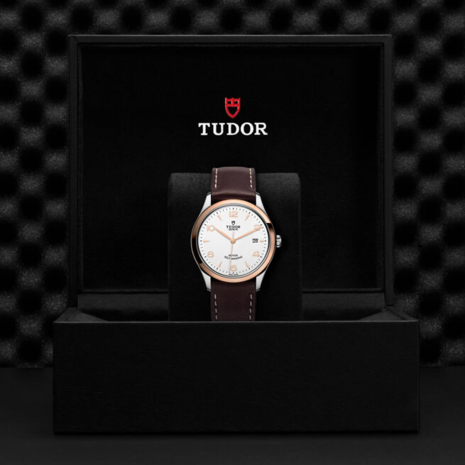 A tudor watch in a black box.