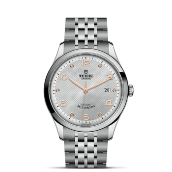 A watch with a M91650-0003 bracelet and white dial.
