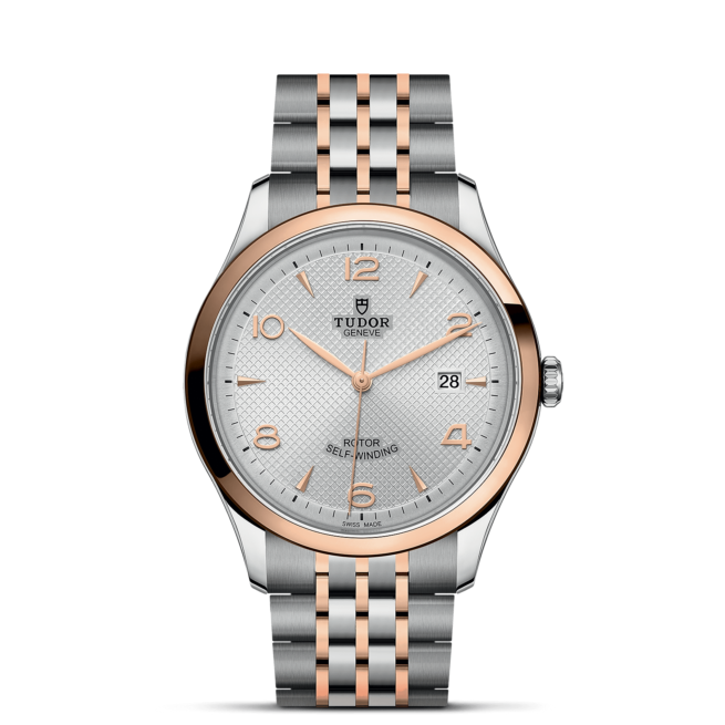 A M91651-0001 watch with a silver and rose gold bracelet.