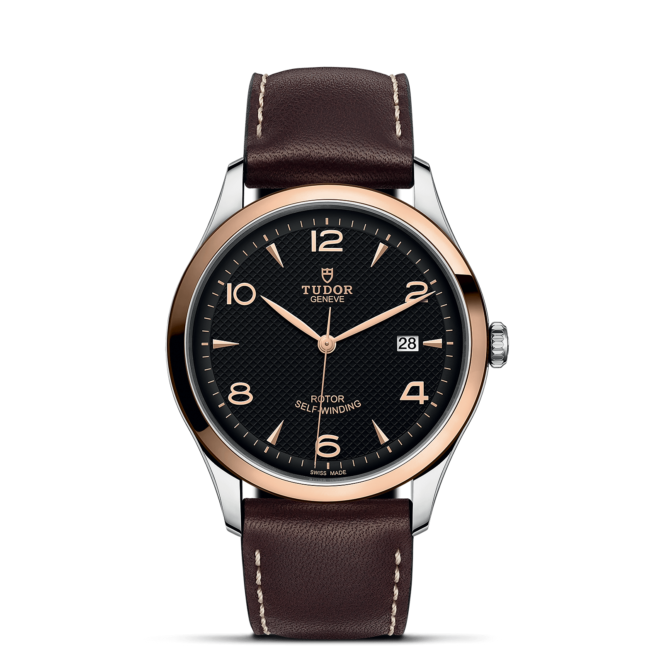 A M91651-0007 with brown leather straps and black dial.