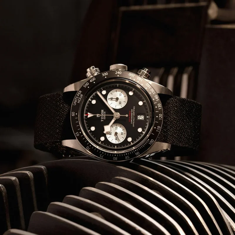 A M79360N-0005 watch sitting on top of a radiator.