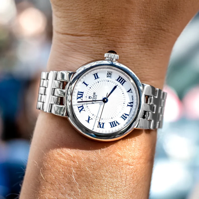 A woman wearing a M35800-0001 with roman numerals.