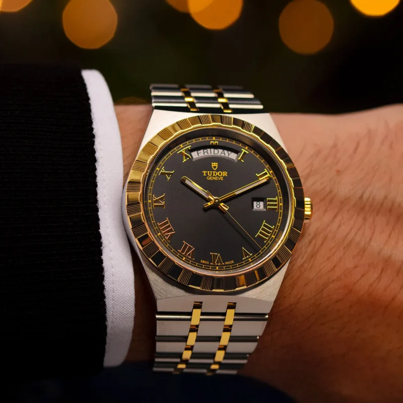 A M28603-0003 watch on a man's wrist.