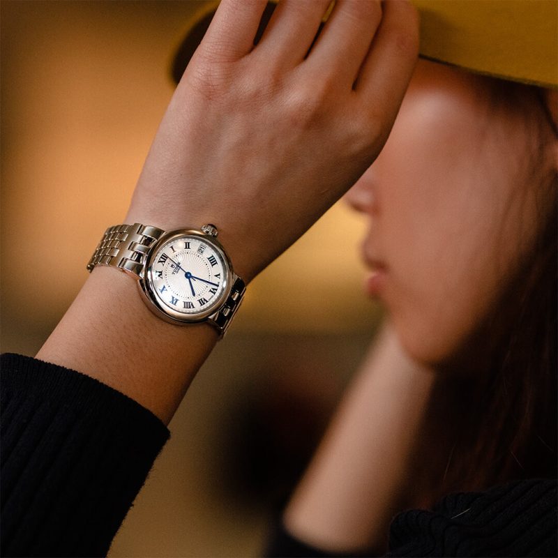A woman wearing a watch.
