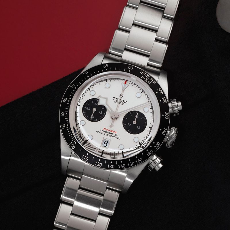 A stainless steel rolex watch with a white dial.