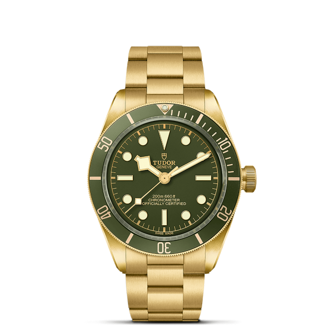 A gold wristwatch with an olive green face, marked with the brand “Tudor” and “200m 660ft Officially Certified”. The watch has a rotating bezel with numerical markers, luminous hands, and hour markers.