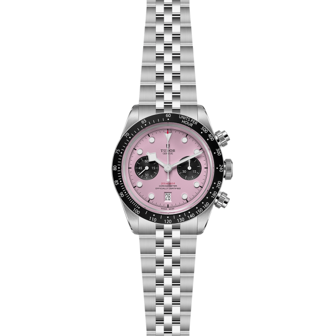 A silver wristwatch with a pink dial, two black sub-dials, and a black bezel, featuring a multi-link bracelet and three pushers on the right side.