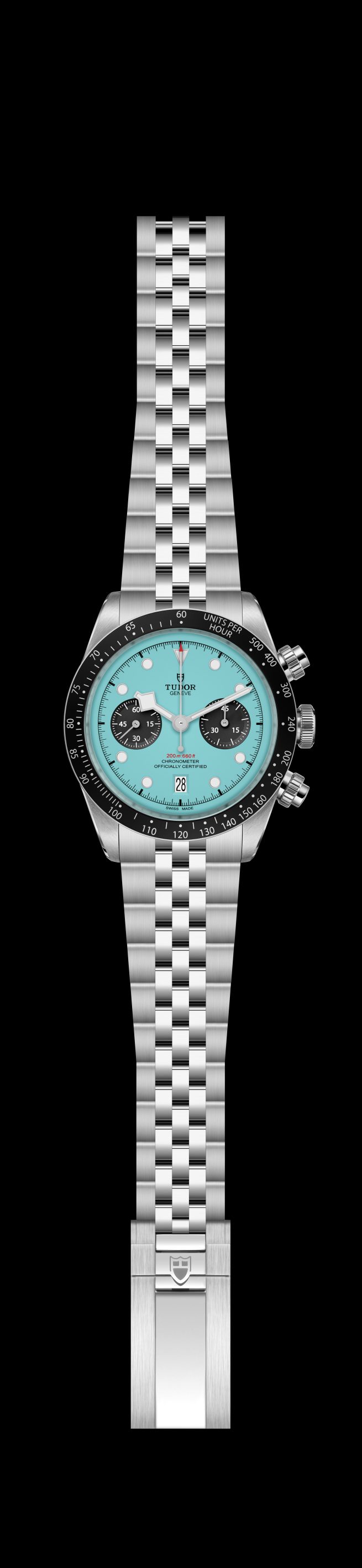 The M79360N-0024 is a silver wristwatch featuring a turquoise face, black bezel, three sub-dials, and Tudor branding on the face and clasp. It comes with a silver link bracelet.