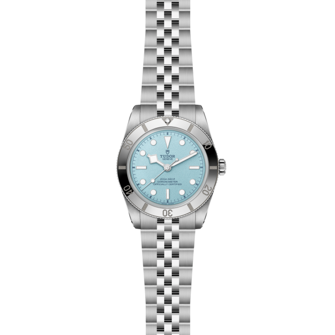The Tudor M79000-0001 is a stainless steel wristwatch featuring a turquoise blue dial, white hour markers, and a silver jubilee-style bracelet.