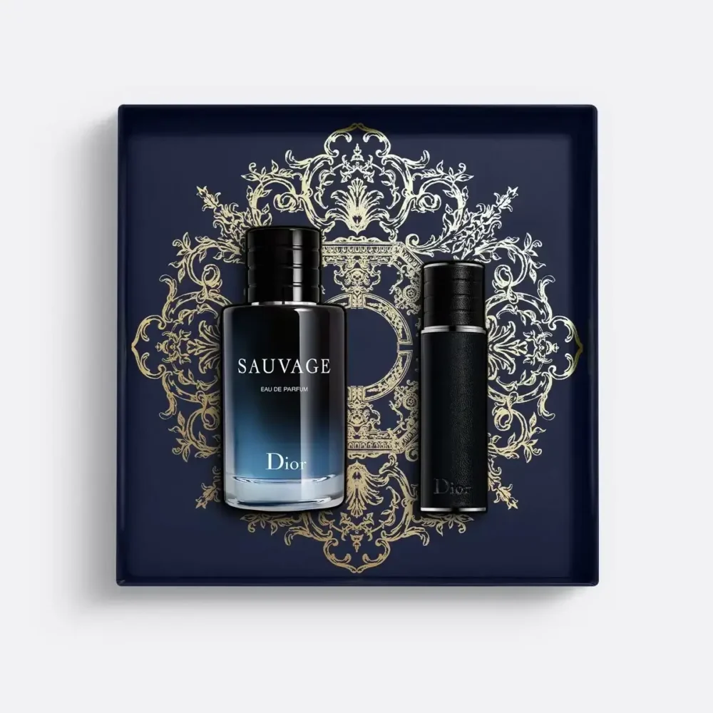 Two Dior Sauvage fragrance products displayed on a blue tray with ornate gold designs.